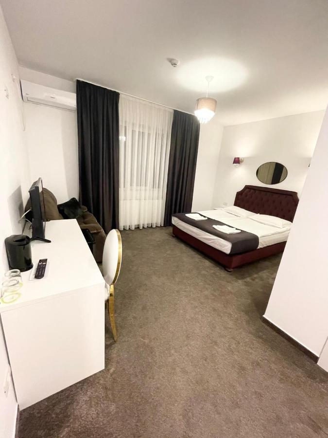 Отель Cochet Boutique Тыргу-Жиу Экстерьер фото