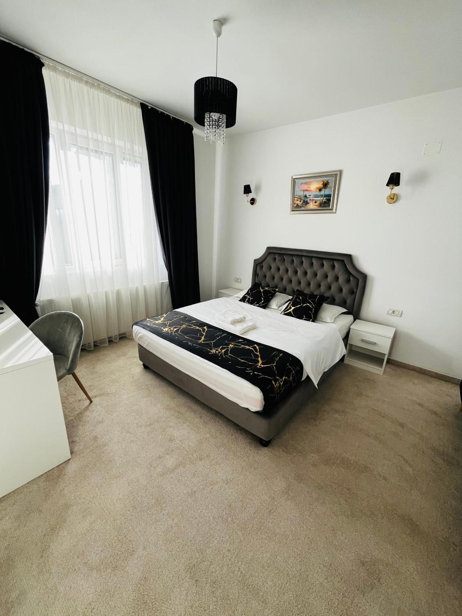 Отель Cochet Boutique Тыргу-Жиу Экстерьер фото